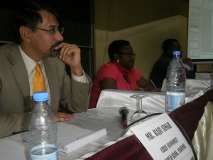 The World Bank official listens to a question from the UB community