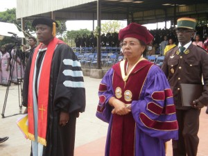 UB VC, Dr Nalova Lyonga (R) & Dr Andrew Ekoka Molindo guest speaker at the Matriculation ceremony in a solemn entry into the UB Open Air Amphitheatre
