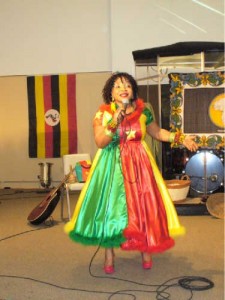 Cameroon singer (Awa Darkjoel) shows off Cameroon colours on stage