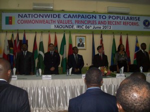 Officials chant the National Anthem during CW campaign at IRIC, Yaounde.