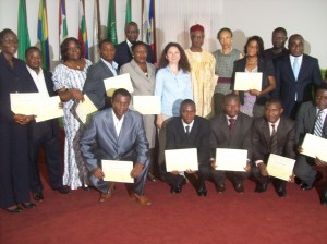 Rector, Oumarou Bouba and Turkish media expert pose with university lecturers who recieved attestation.