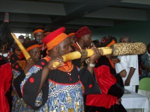 men use traditional musical instruments to animate the BOCUDA fund raiser.
