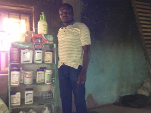 Daniel Takang in standing in poultry feed room 