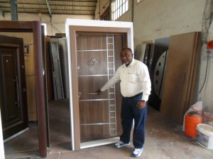 A sample of the bullet-proof doors manufactured by Guff Steel Industries, Cameroon being displayed by Dr Sigalla