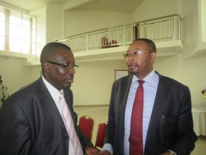 Rumpi Project Coordinator, Besong Ogork(L) sharing views with a steering committee member