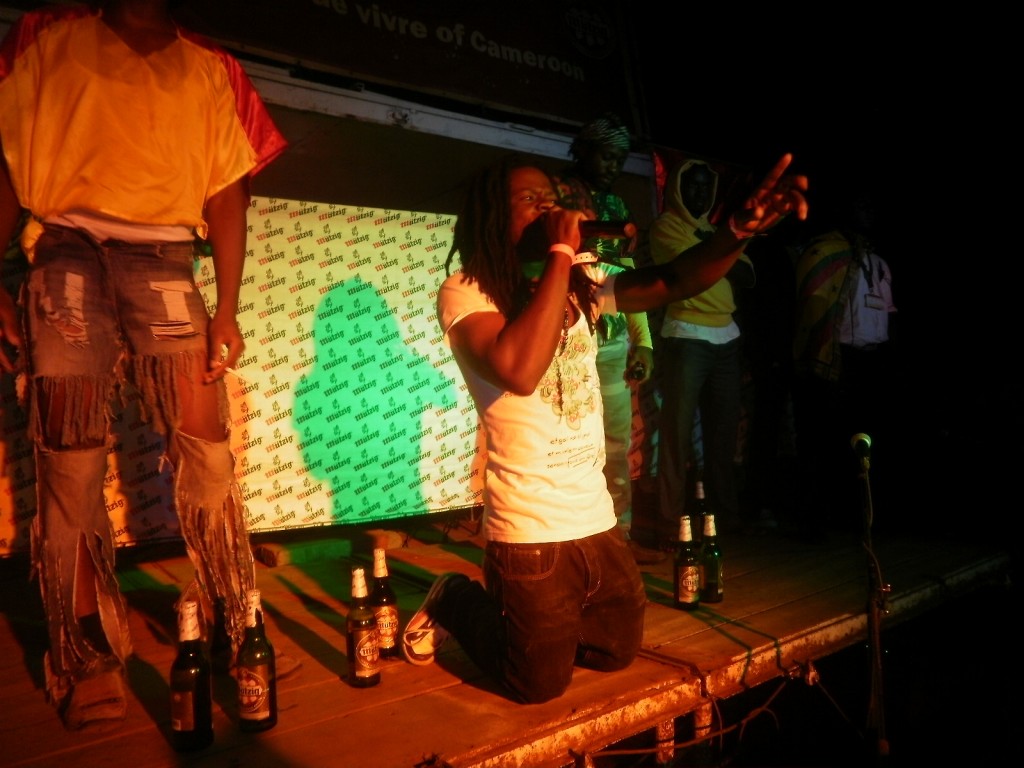 A contestant of the Bob Marley songs competition doing his show