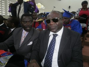 Dr. George Enow Orock (R), Director, Buea Regional Hospital and lecturer at UB's Faculty of Health Sciences at the convocation ceremony.JPG