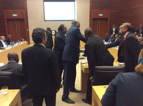 Members of the Cameroonian delegation being congratulated by CAF officials and the Executive Committee members